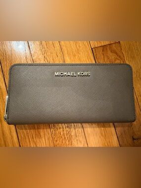 Michael Kors taupe Saffiano zip-around wallet with gold logo